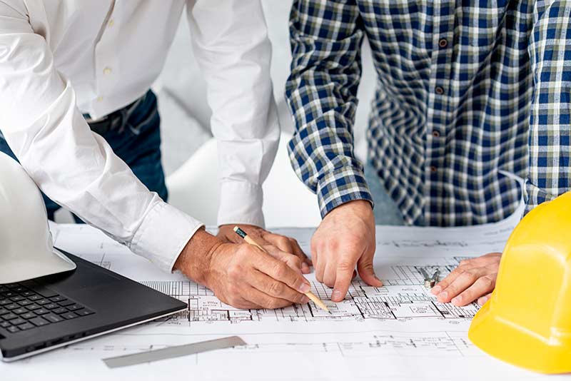 Architect Showing Project Client Comprime